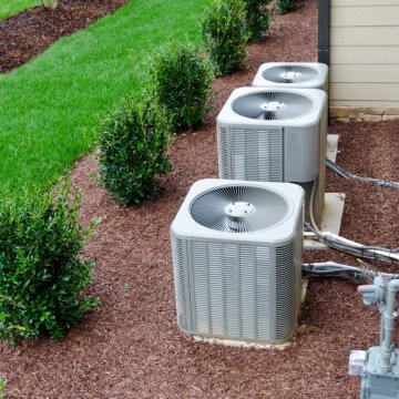 hvac system beside a house